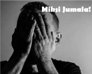 Mies, kädet kasvojen edessä
